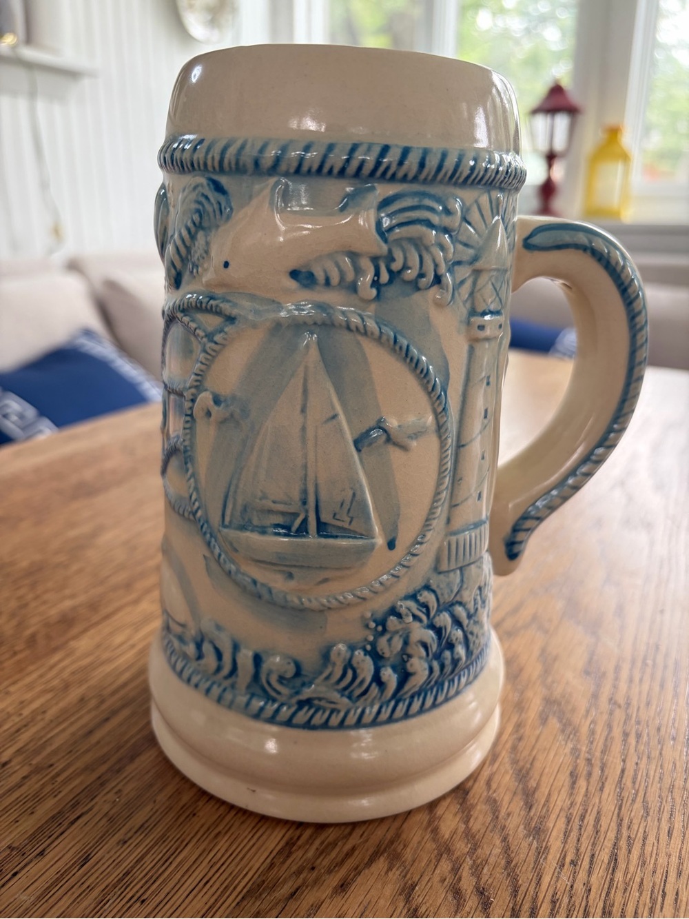 Source Unknown Cream Ceramic Sailboat Stein with Blue Relief